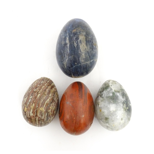 1087 - Natural History / Geology Interest: Four polished hardstone specimen eggs to include lapis lazuli, a... 