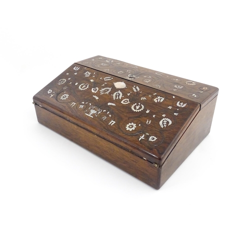 1097 - A Victorian rosewood writing slope with inlaid floral and foliate mother of pearl decoration, the to... 