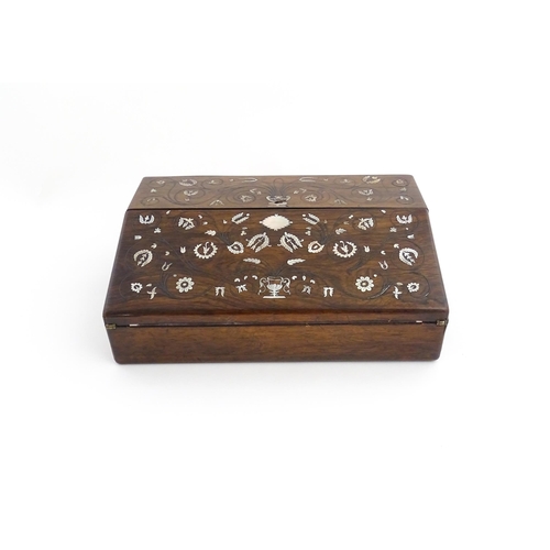 1097 - A Victorian rosewood writing slope with inlaid floral and foliate mother of pearl decoration, the to... 