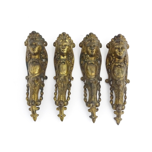 1098 - Four 19thC brass caryatid mounts. Approx. 9