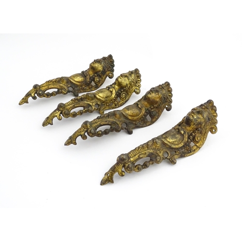 1098 - Four 19thC brass caryatid mounts. Approx. 9