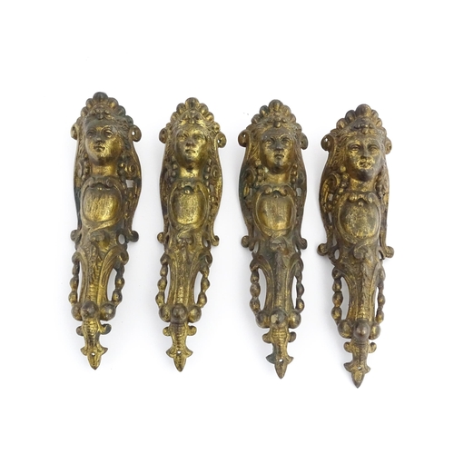 1098 - Four 19thC brass caryatid mounts. Approx. 9