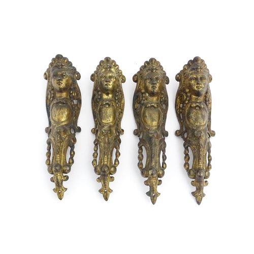 1098 - Four 19thC brass caryatid mounts. Approx. 9