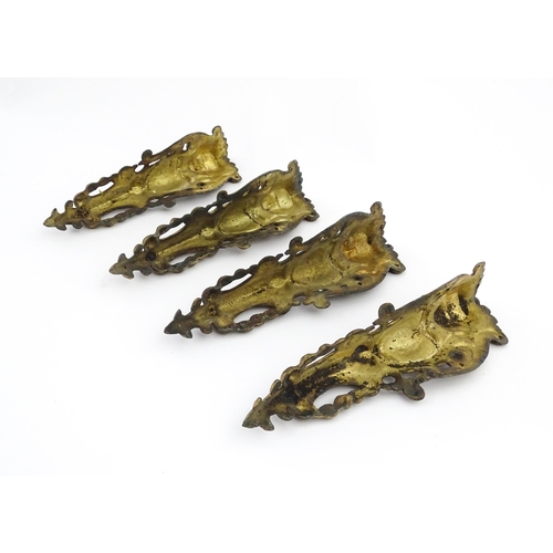 1098 - Four 19thC brass caryatid mounts. Approx. 9