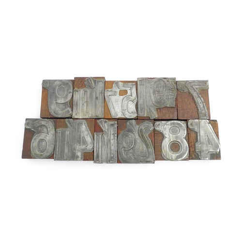 1099 - A quantity of vintage letterpress printing blocks for pre decimalisation prices, to include sixpence... 