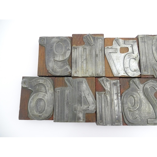 1099 - A quantity of vintage letterpress printing blocks for pre decimalisation prices, to include sixpence... 