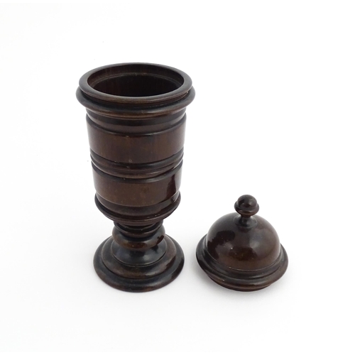 1121 - Treen : A 19thC turned mahogany lidded spice jar of unusual form. From the A. J. Levi Collection, no... 