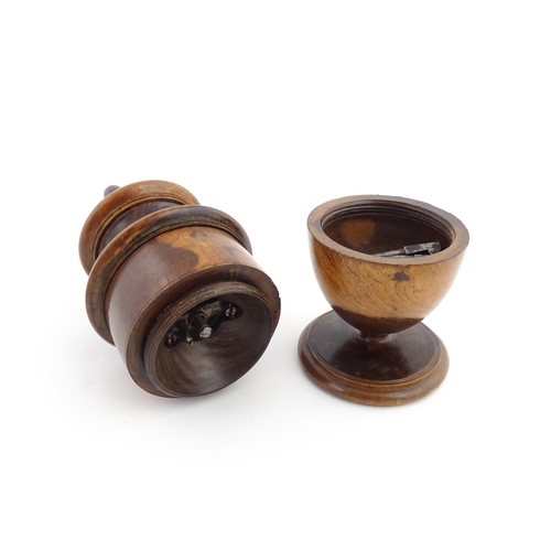 1123 - Treen : An 18thC lignum vitae spice / coffee grinder of urn form, the iron spigot concealed by an ac... 