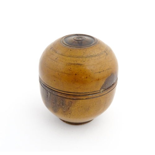 1125 - Treen : A 19thC turned boxwood ointment jar and cover. Approx. 3 1/4