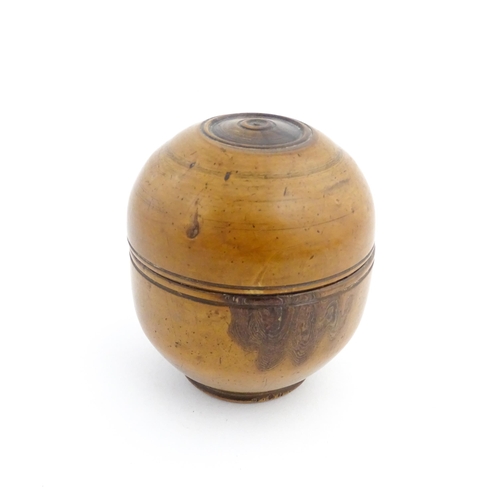 1125 - Treen : A 19thC turned boxwood ointment jar and cover. Approx. 3 1/4