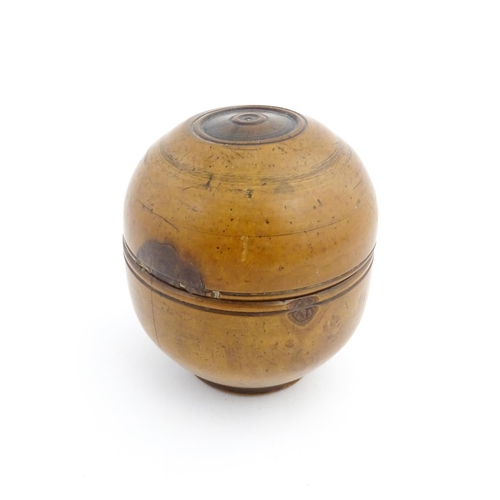 1125 - Treen : A 19thC turned boxwood ointment jar and cover. Approx. 3 1/4