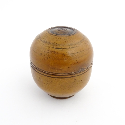 1125 - Treen : A 19thC turned boxwood ointment jar and cover. Approx. 3 1/4