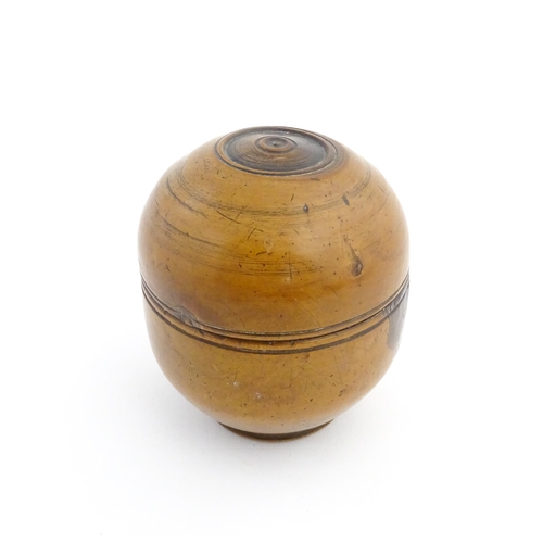 1125 - Treen : A 19thC turned boxwood ointment jar and cover. Approx. 3 1/4