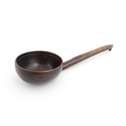 1126 - Treen : A large 19thC Welsh cawl serving ladle. Approx. 15 3/4