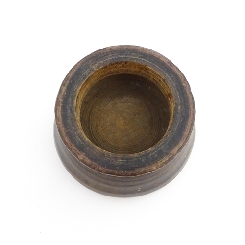 1127 - Treen : An 18thC three sectional turned nutmeg / spice with banded decoration. Approx. 7