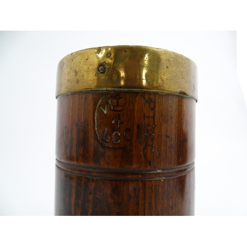 1128 - Treen : Three graduated Victorian and later oak dry measures with brass rims, comprising Quart, Pint... 