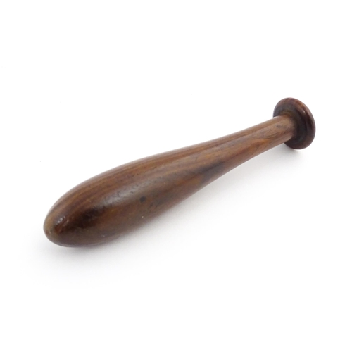 1129 - Treen : A 19thC lignum vitae snuff pestle and mortar of tapering form. Mortar approx. 4 1/4