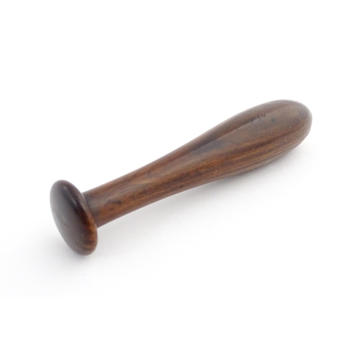 1129 - Treen : A 19thC lignum vitae snuff pestle and mortar of tapering form. Mortar approx. 4 1/4