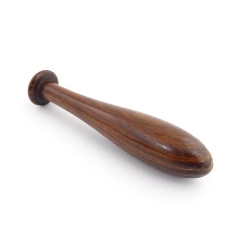 1129 - Treen : A 19thC lignum vitae snuff pestle and mortar of tapering form. Mortar approx. 4 1/4