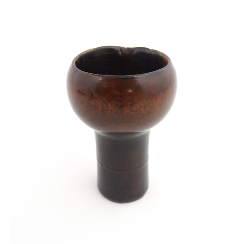 1129 - Treen : A 19thC lignum vitae snuff pestle and mortar of tapering form. Mortar approx. 4 1/4