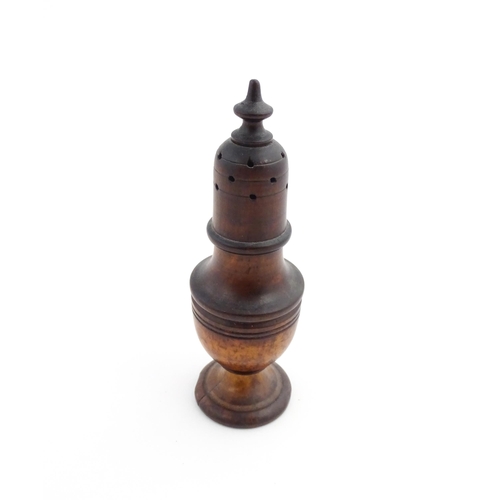 1132 - Treen : A 19thC turned wooden muffineer. Approx. 6 1/2