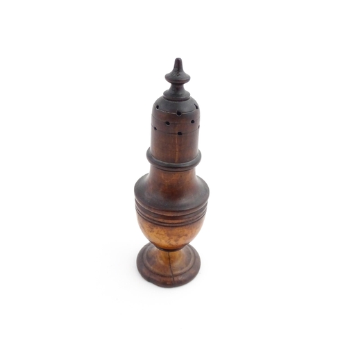 1132 - Treen : A 19thC turned wooden muffineer. Approx. 6 1/2