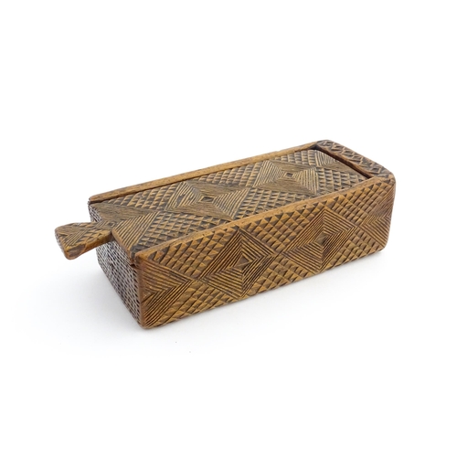 1133 - Treen : A 19thC folk art chip carved box with geometric detail and sliding top. Approx. 8 1/4