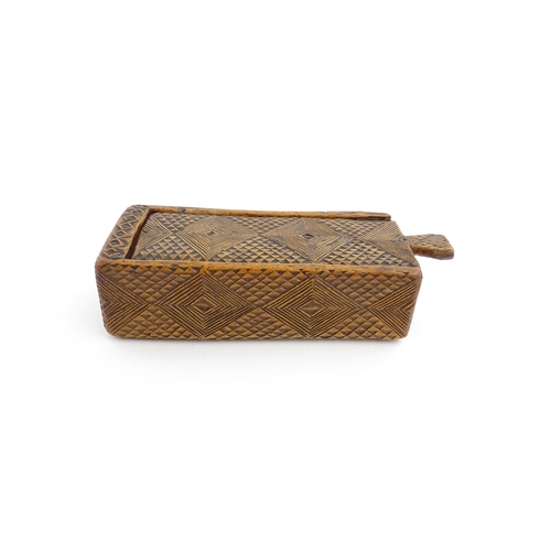 1133 - Treen : A 19thC folk art chip carved box with geometric detail and sliding top. Approx. 8 1/4