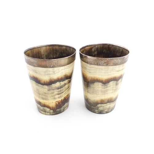 1137 - A pair of 19thC Scottish horn beakers with white metal rims. Approx. 3 3/4