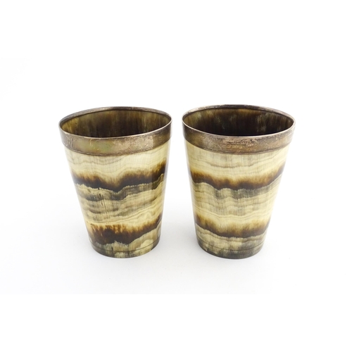 1137 - A pair of 19thC Scottish horn beakers with white metal rims. Approx. 3 3/4