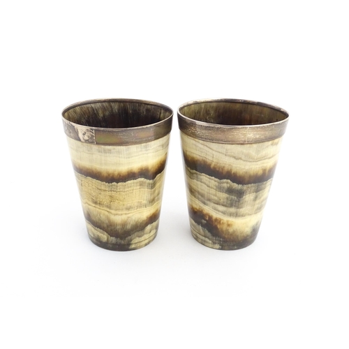 1137 - A pair of 19thC Scottish horn beakers with white metal rims. Approx. 3 3/4