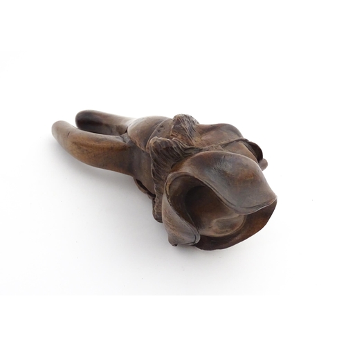 1150 - Treen : A 19thC novelty treen nutcracker modelled as a man wearing a tricorn hat and spectacles. App... 