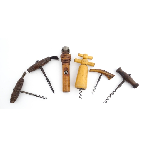 1152 - A quantity of assorted 19thC and later corkscrews to include examples with turned wooden handles and... 