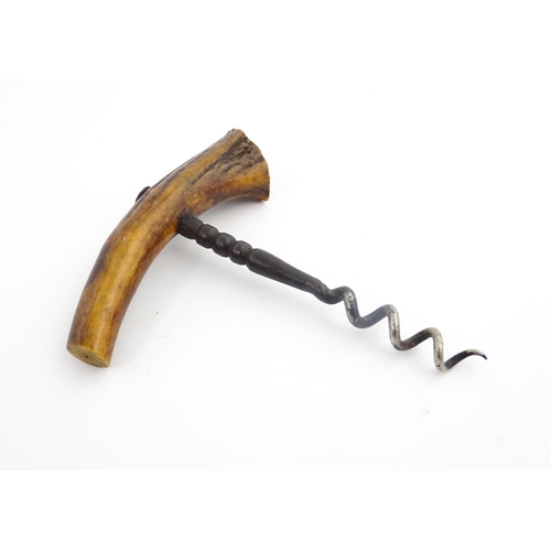 1152 - A quantity of assorted 19thC and later corkscrews to include examples with turned wooden handles and... 