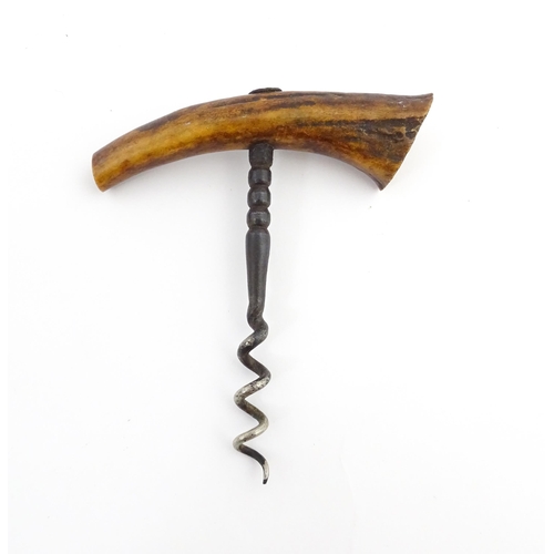 1152 - A quantity of assorted 19thC and later corkscrews to include examples with turned wooden handles and... 