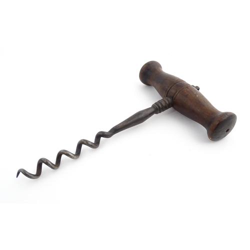 1152 - A quantity of assorted 19thC and later corkscrews to include examples with turned wooden handles and... 