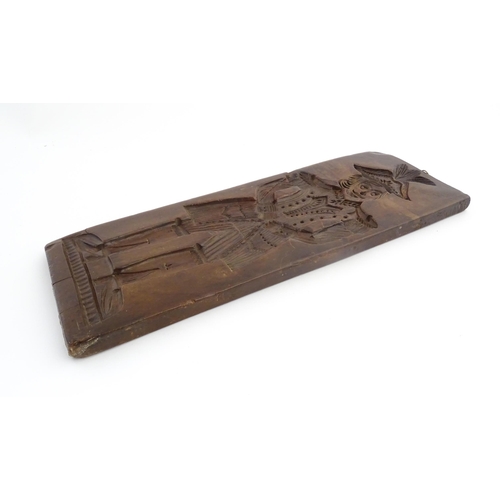 1155 - Treen : A large 19th Continental carved fruitwood gingerbread biscuit / cookie mould depicting a Dut... 