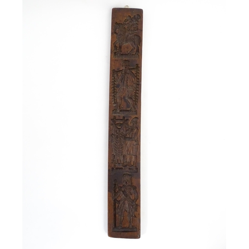 1157 - Treen : A 19thC Continental double sided carved fruitwood gingerbread biscuit / cookie mould with fi... 