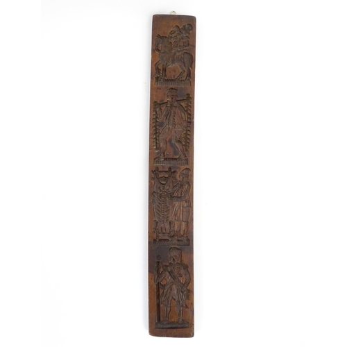 1157 - Treen : A 19thC Continental double sided carved fruitwood gingerbread biscuit / cookie mould with fi... 