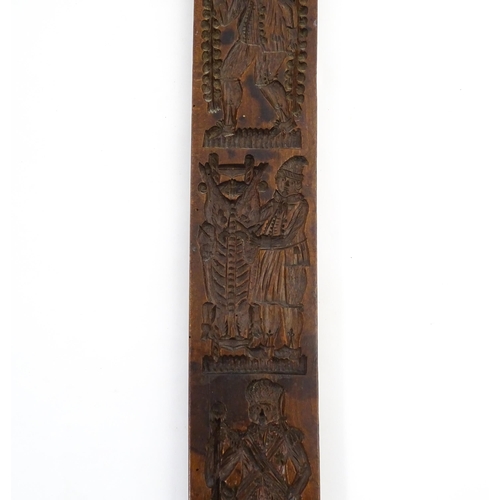 1157 - Treen : A 19thC Continental double sided carved fruitwood gingerbread biscuit / cookie mould with fi... 