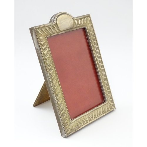 485 - An easel back photograph frame with silver surround hallmarked London 2011, maker Highfield Frames. ... 