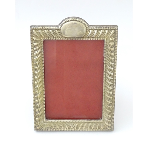 485 - An easel back photograph frame with silver surround hallmarked London 2011, maker Highfield Frames. ... 