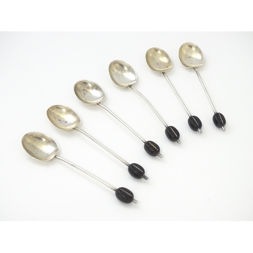 504 - A cased set of six silver coffee spoons with coffee bean finials, hallmarked Birmingham 1932, maker ... 