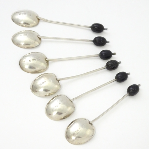 504 - A cased set of six silver coffee spoons with coffee bean finials, hallmarked Birmingham 1932, maker ... 