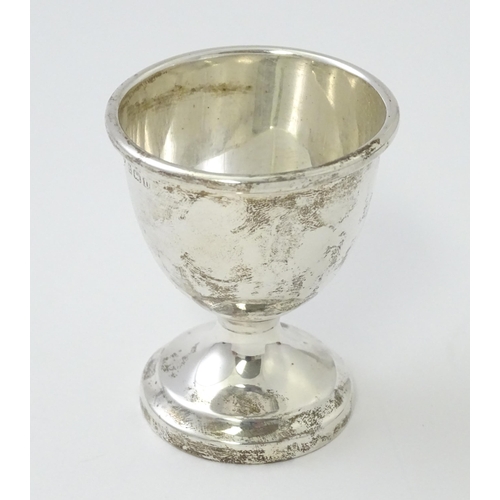 505 - A cased silver Christening set comprising egg cup and spoon hallmarked Birmingham 1944, maker Lanson... 