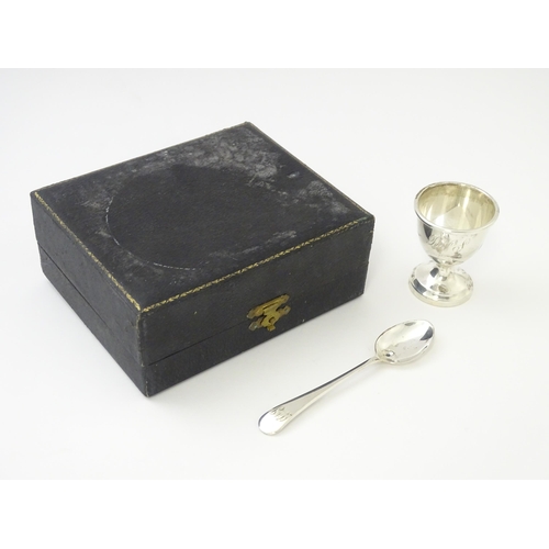 505 - A cased silver Christening set comprising egg cup and spoon hallmarked Birmingham 1944, maker Lanson... 