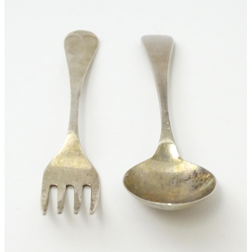 508 - A silver Christening set comprising spoon and fork hallmarked Sheffield 1951 / 52, maker Viner's Ltd... 