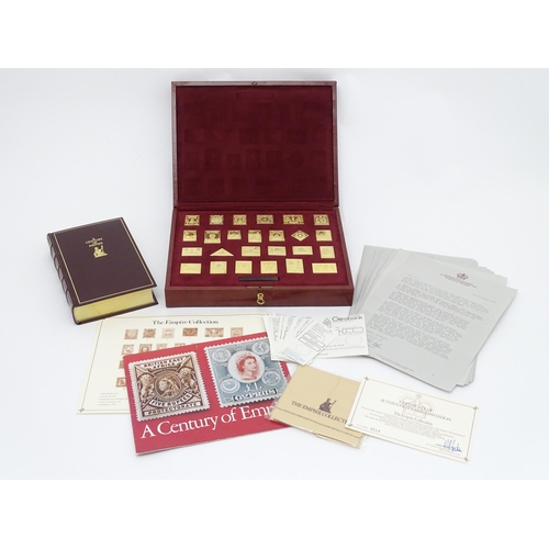 512 - The Empire Collection - A limited edition set of silver gilt replicas of British Empire postal stamp... 