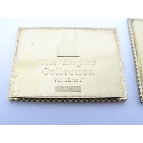 512 - The Empire Collection - A limited edition set of silver gilt replicas of British Empire postal stamp... 