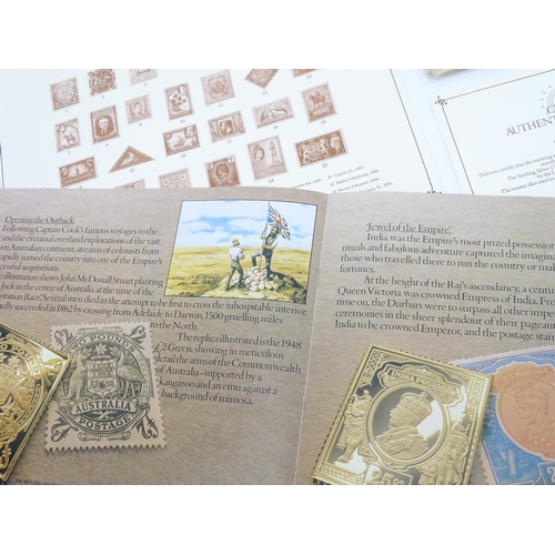 512 - The Empire Collection - A limited edition set of silver gilt replicas of British Empire postal stamp... 